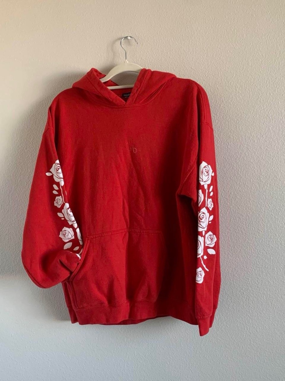Red Hooded Sweatshirt with White Rose Sleeve Print